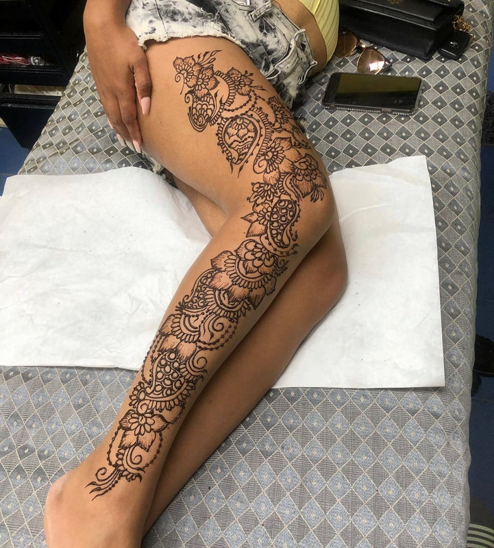 A leg with a Henna design Stock Photo  Alamy